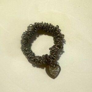Silver coil heart bracelet with rhinestones or cubic zirconia